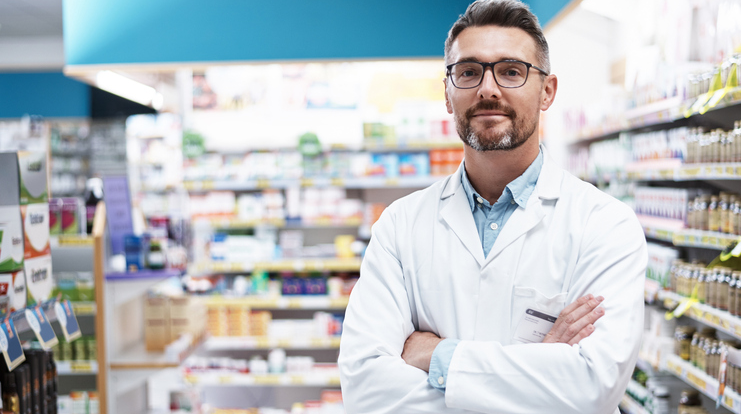 Male Pharmacist Posing in Store